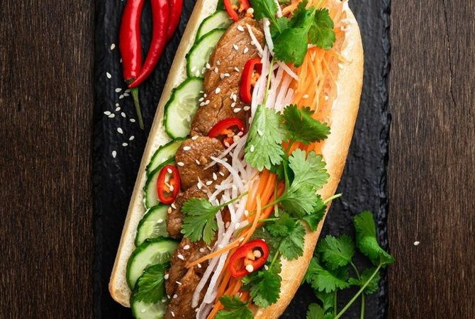 Vietnamese Bánh Mì at Wrap N Roll Saskatoon — Vietnamese sub with pâté, pork roll, carrots and cilantro